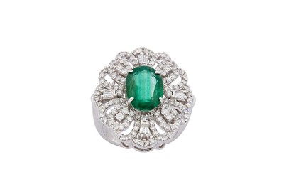 Lot 76 - An emerald and diamond dress ring The...