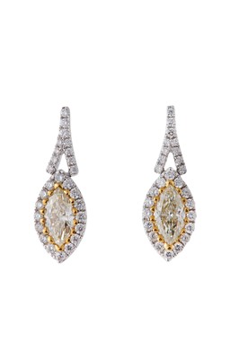 Lot 57 - A pair of diamond pendent earrings Each...