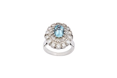 Lot 145 - An aquamarine and diamond cluster ring   The...