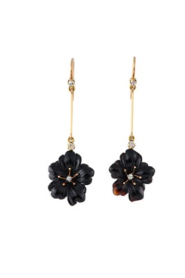 Lot 117 - A pair of onyx flower pendent earrings Each...