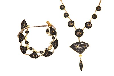 Lot 19 - A Shakudo-style pendant necklace and bracelet,...