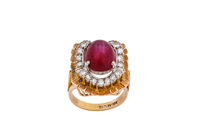 Lot 40 - A ruby and diamond ring, by Jack Gutschneider,...