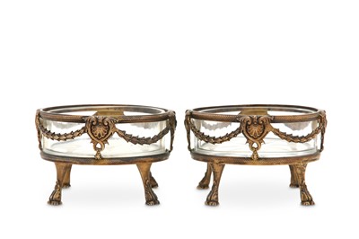 Lot 480 - A pair of George V sterling silver-gilt salts,...