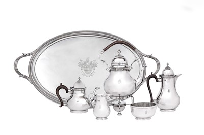 Lot 519 - An Edwardian sterling silver five-piece tea...