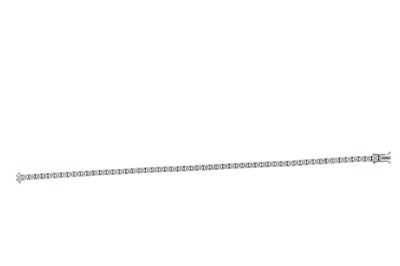 Lot 184 - A diamond line bracelet The articulated line...