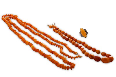 Lot 184 - A strand of butterscotch amber beads,composed...