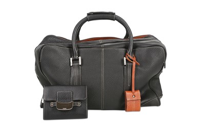 Lot 14 - Tod's Black Leather Travel Bag, zipped central...