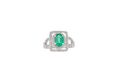 Lot 297 - An emerald and diamond ring  Designed as an...