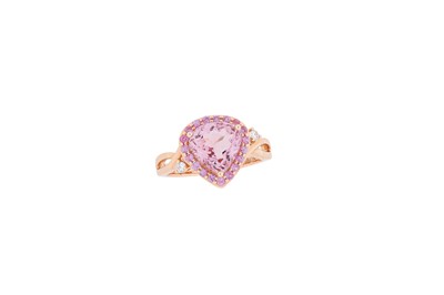 Lot 285 - A morganite, pink sapphire and diamond cluster...