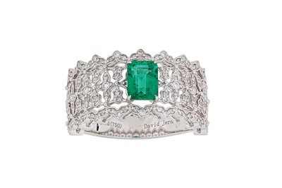 Lot 271 - An emerald and diamond ring The step-cut...