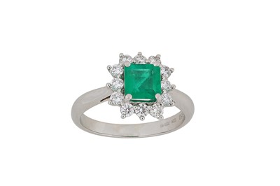 Lot 279 - An emerald and diamond ring The step-cut...