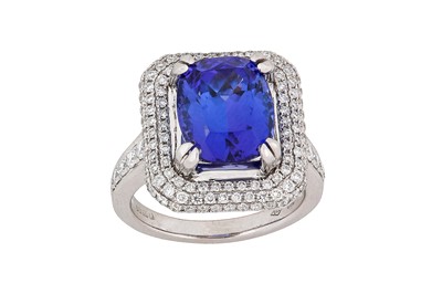 Lot 301 - A tanzanite and diamond cluster ring The...