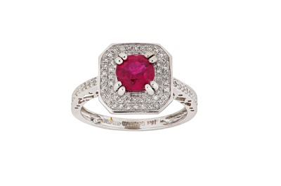 Lot 292 - A ruby and diamond ring The cushion-shaped...