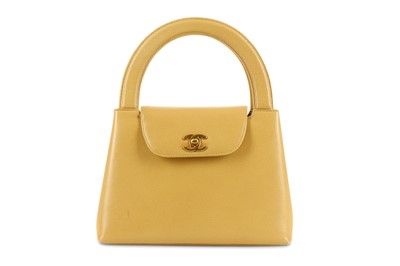 Lot 344 - Chanel Beige Top Handle Handbag, c. 1997-99,...