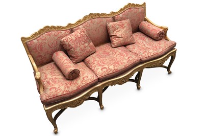 Lot 457 - A French Louis XV style carved giltwood triple...