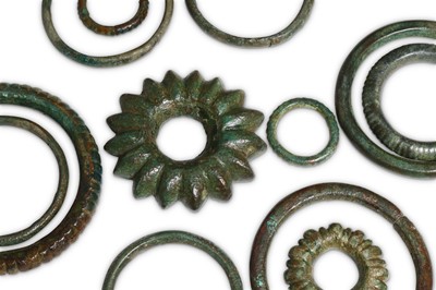 Lot 57 - A GROUP OF BRONZE AGE RINGS Circa 1st...
