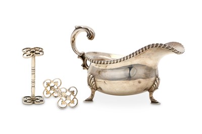 Lot 65 - A George V sterling silver sauceboat, London...