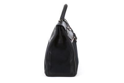 Lot 36 - Hermès Black Clemence and Toile Lakis Kelly 40,...
