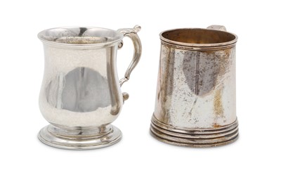 Lot 62 - Two sterling silver christening mugs, both in...