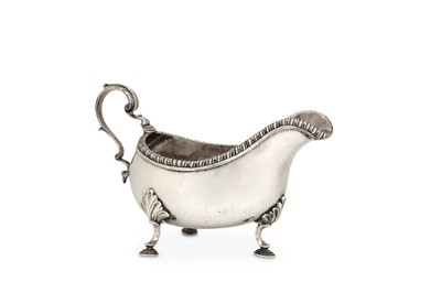 Lot 511 - A George III sterling silver sauce boat,...