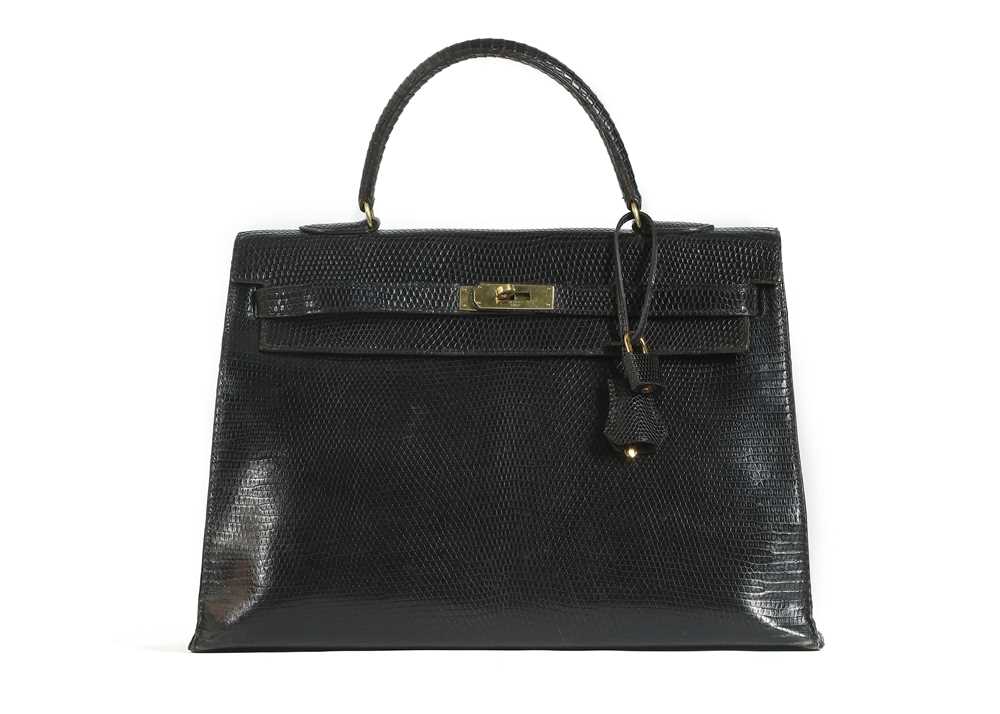 Lot 63 - Hermès Black Lizard Kelly Sellier 35, c. 1962,...