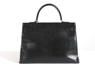 Lot 63 - Hermès Black Lizard Kelly Sellier 35, c. 1962,...