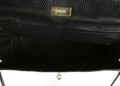 Lot 63 - Hermès Black Lizard Kelly Sellier 35, c. 1962,...