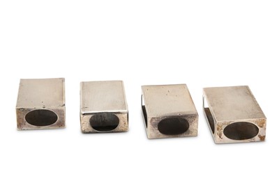 Lot 67 - A matched set of four sterling silver match...