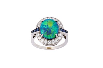 Lot 244 - A black opal, sapphire and diamond ring, circa...