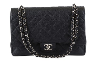 Lot 30 - Chanel Black Maxi Double Flap Bag, c. 2012,...