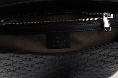Lot 140 - Gucci Black Signature Messenger Bag, heat...