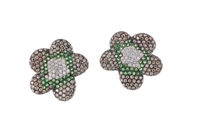 Lot 82 - A pair of gem-set flower earrings Each earring...