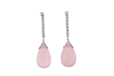 Lot 124 - A pair of rose quartz and diamond pendent...