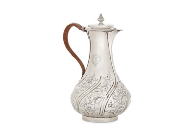 Lot 438 - A George III sterling silver hot water pot,...