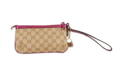 Lot 214 - Gucci Supreme Wristlet Pochette, metallic pink...