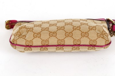 Lot 214 - Gucci Supreme Wristlet Pochette, metallic pink...