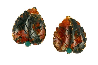 Lot 19 - A pair of gem-set leaf earclips Each carved...