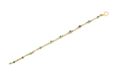 Lot 87 - An emerald and diamond bracelet, first quarter...