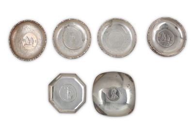 Lot 88 - Eight silver coin or medallion set ashtrays,...