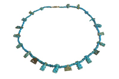Lot 31 - AN EGYPTIAN MUMMY BEAD NECKLACE Middle Kingdom,...
