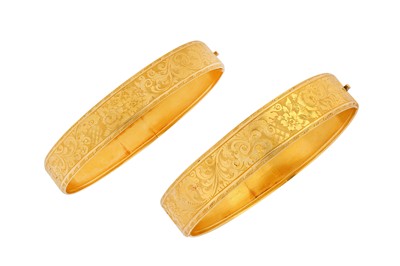 Lot 7 - A pair of late 19th century bangles Each...