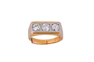 Lot 205 - A diamond three-stone ring The bi-coloured...