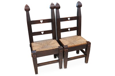 Lot 299 - A pair of large Arts and Crafts fruitwood...