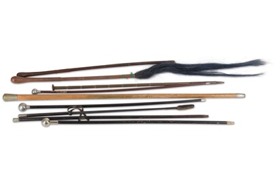 Lot 343 - A collection of nine military walking sticks...