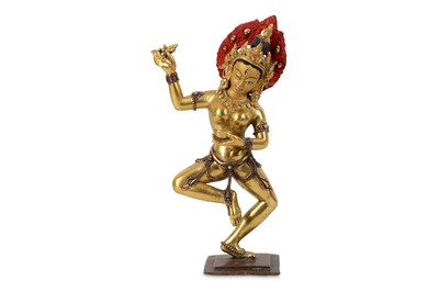 Lot 184 - A Nepalese gilt-bronze figure of Vajrayogini,...