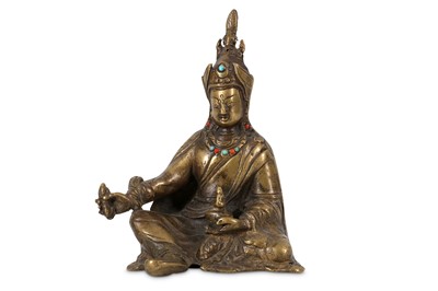 Lot 185 - A Tibetan gilt bronze figure of Pema Jungne,...