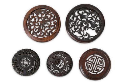 Lot 369 - FIVE CHINESE WOOD JAR COVERS.