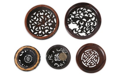 Lot 369 - FIVE CHINESE WOOD JAR COVERS.