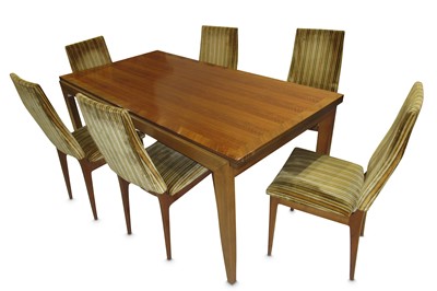 Lot 415 - A 1970s walnut and cross banded extending...