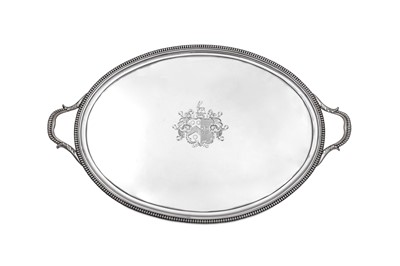 Lot 130 - A large George III sterling silver twin...